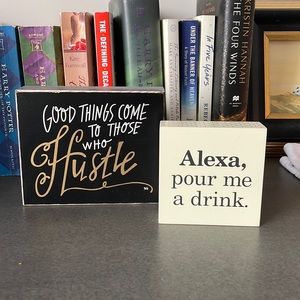 Two wooden decorative canvases